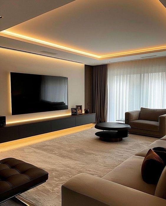 Modern living room with floating media wall, backlit ceiling and plush seating